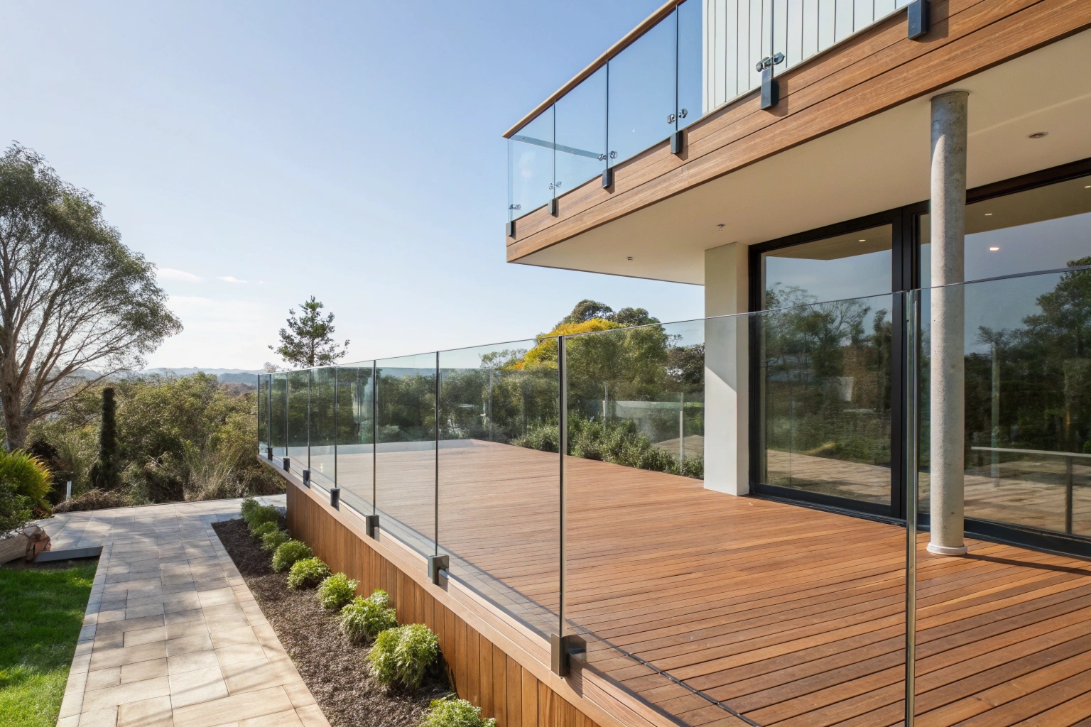 Elevated timber deck with glass panel balustrade on Adelaide home