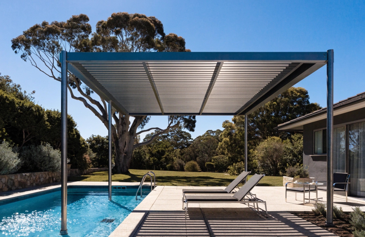 Closed retractable roof pergola providing shade over an Adelaide pool entertaining area